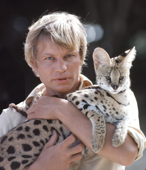 Michael York in The Island of Dr Moreau with serval cat